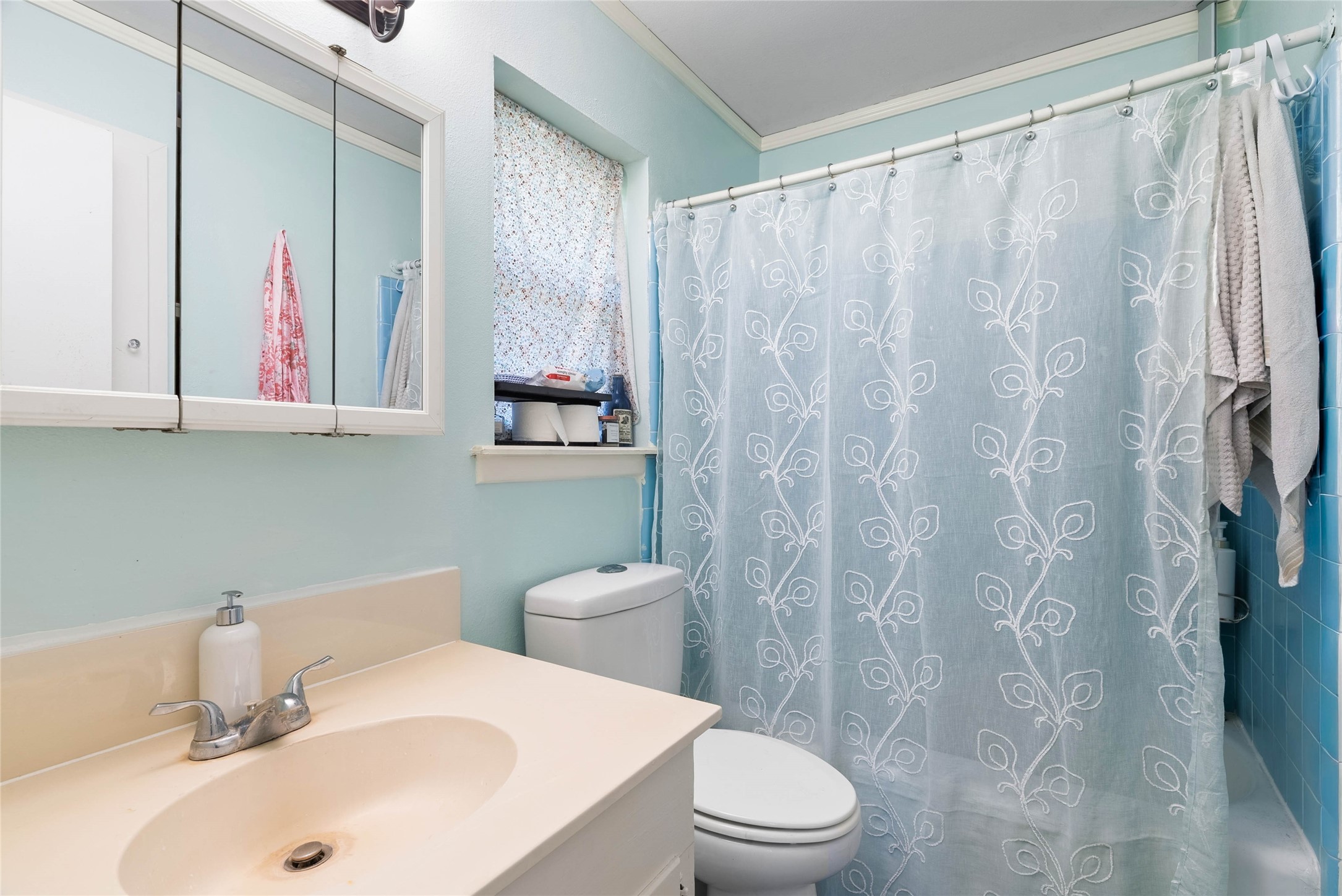 168 Sunset Ingleside, TX 78362 - Photo 16 of 26 Clean and functional full bathroom equipped with a shower/tub combination and single vanity.