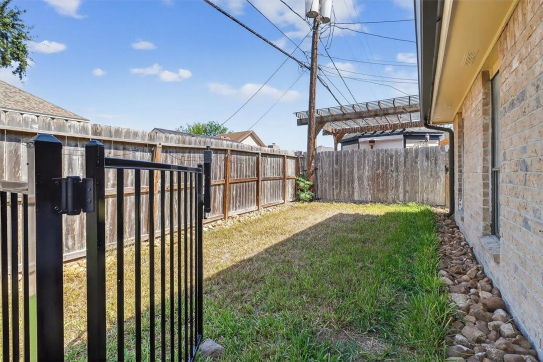 5410 Fox Run Drive Corpus Christi, TX 78413 - Photo 39 of 40 a view of a backyard with pathway