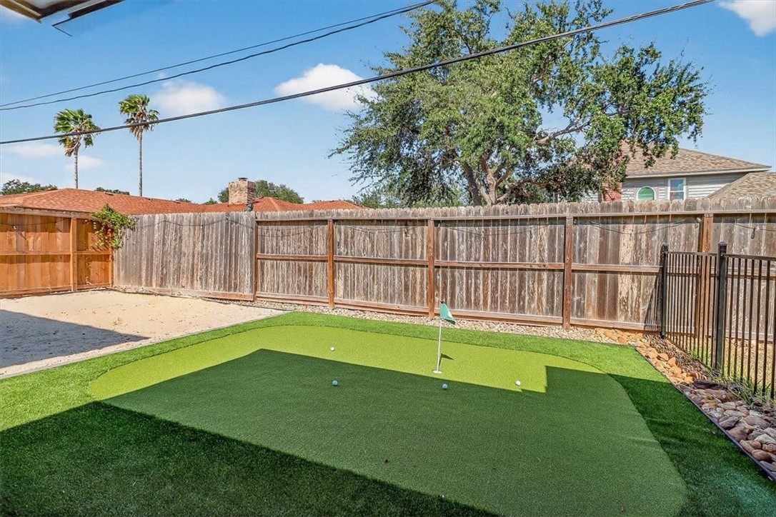 5410 Fox Run Drive Corpus Christi, TX 78413 - Photo 9 of 40 a view of a backyard with a small cabin