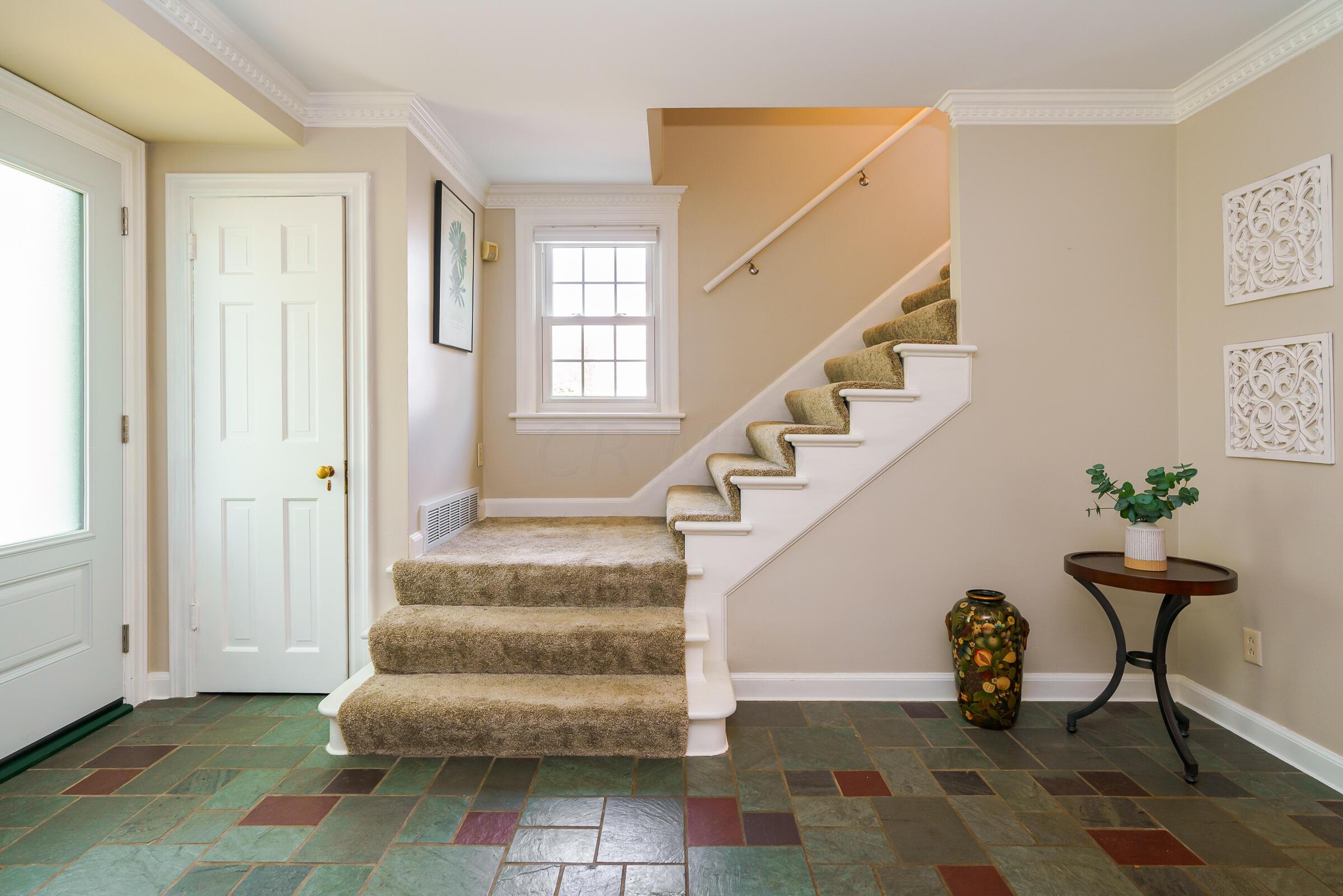 2734 York Road Upper Arlington, OH 43221 - Photo 6 of 40 The foyer features slate flooring and a convenient coat closet