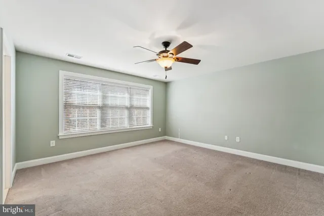 a bathroom with a sink a toilet and bathtub