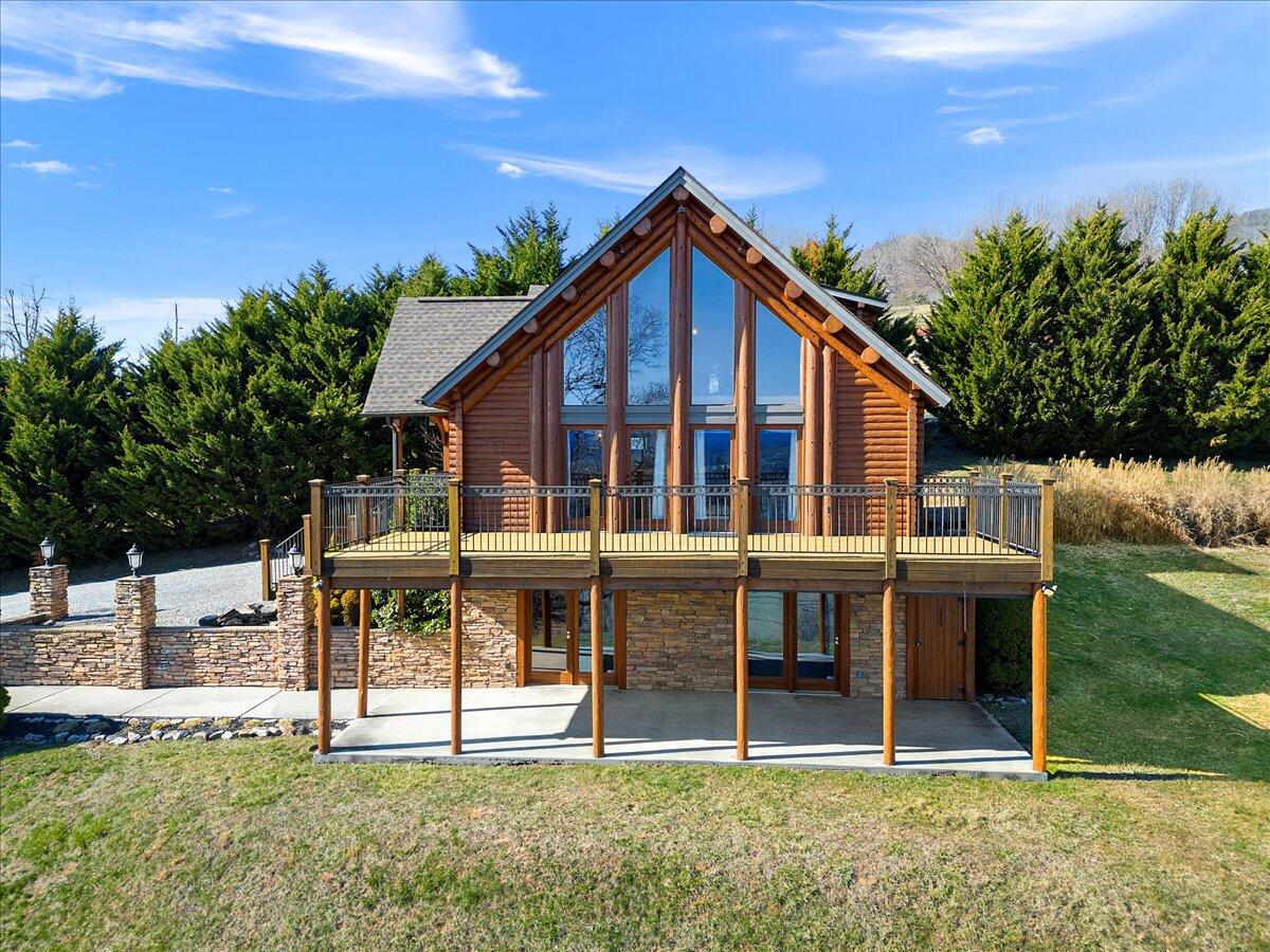 2665 Old Rte 100 Road Draper, VA 24324 - Photo 6 of 105 a view of house with backyard and outdoor seating