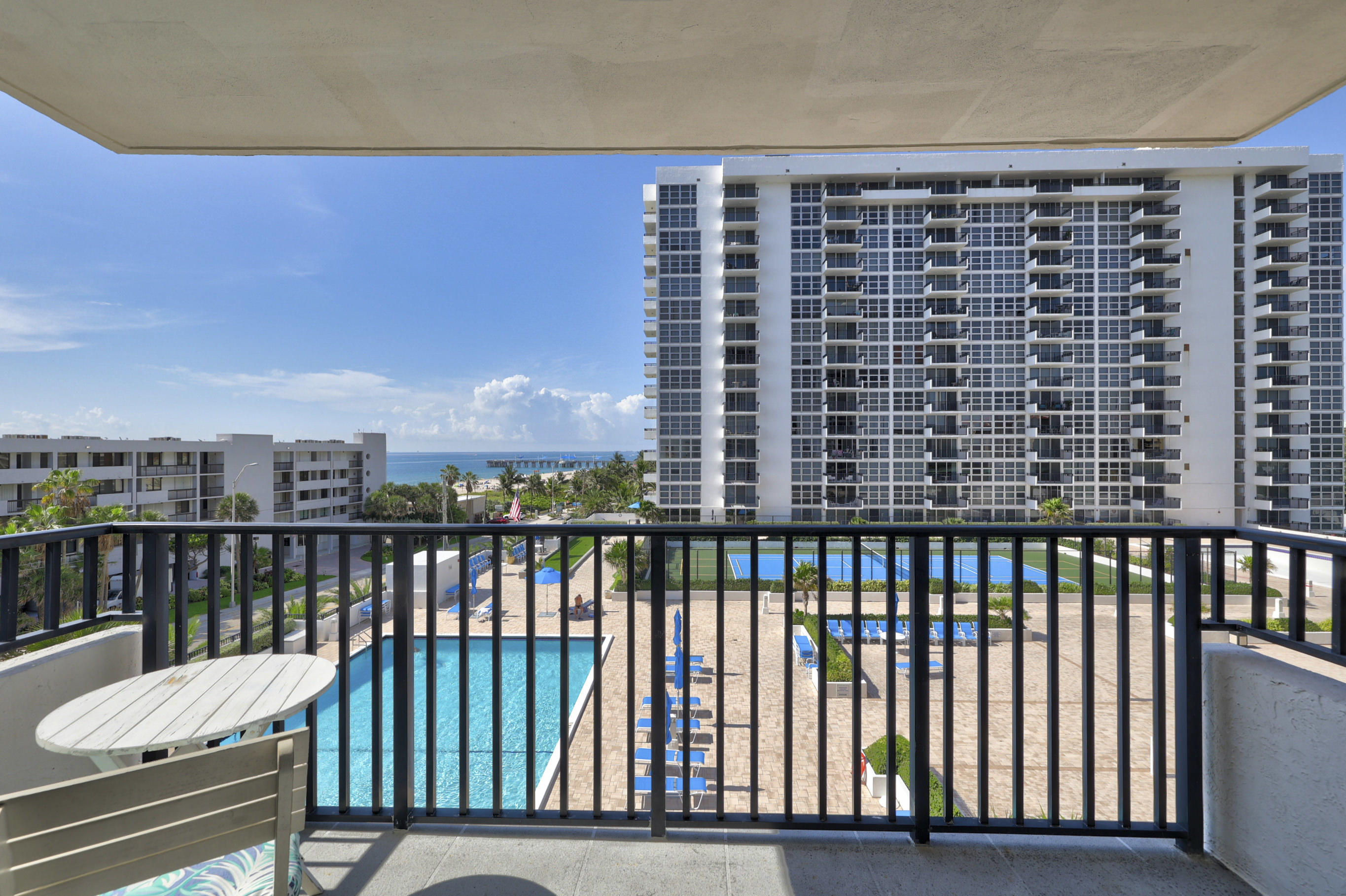 531 North Ocean Boulevard, Unit 710 Pompano Beach, FL 33062 - Photo 3 of 39 a view of a balcony with a chair