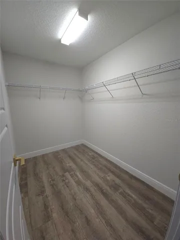 a view of a room with racks on the wall