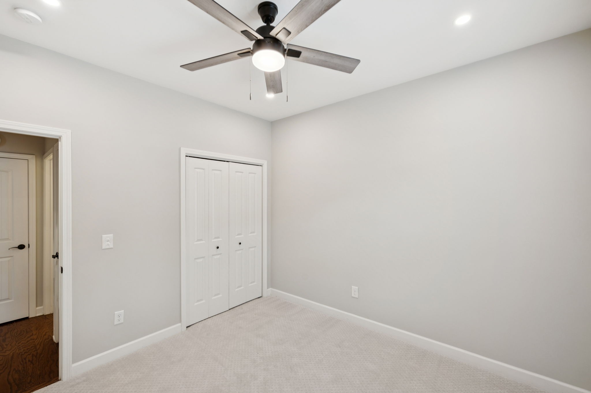 1101 Downs Boulevard, Unit 295 Franklin, TN 37064 - Photo 24 of 33 an empty room with a fan and a fan