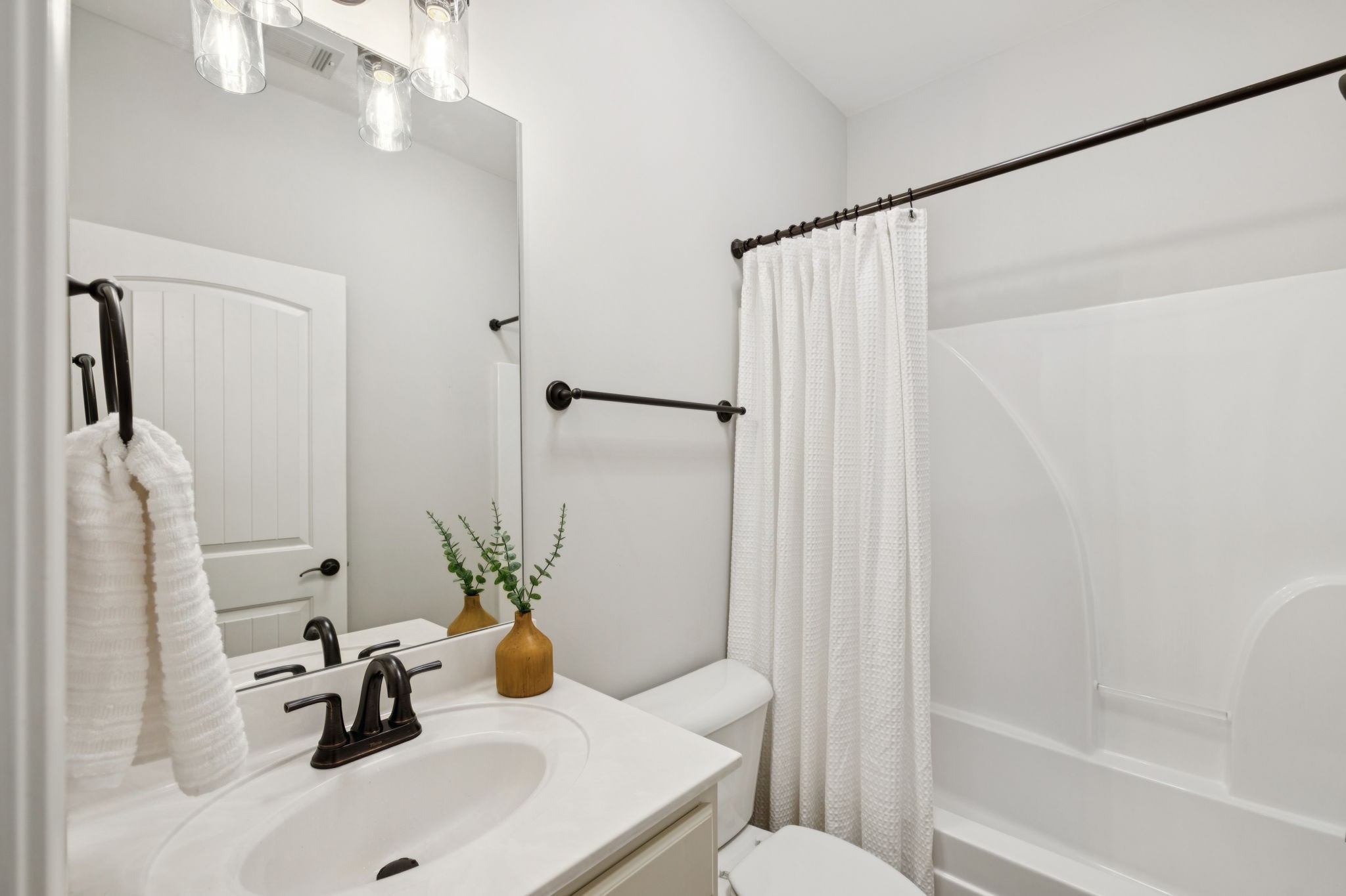 1101 Downs Boulevard, Unit 295 Franklin, TN 37064 - Photo 25 of 33 a bathroom with a sink toilet and shower