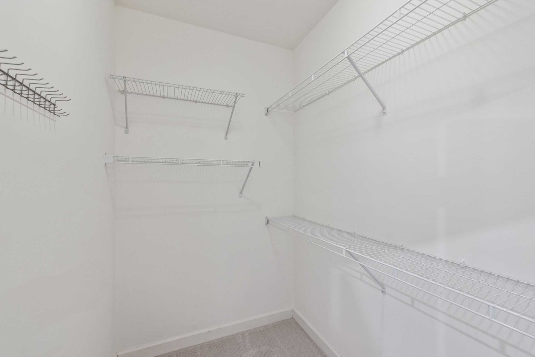 1101 Downs Boulevard, Unit 295 Franklin, TN 37064 - Photo 27 of 33 a view of a room with racks on the wall