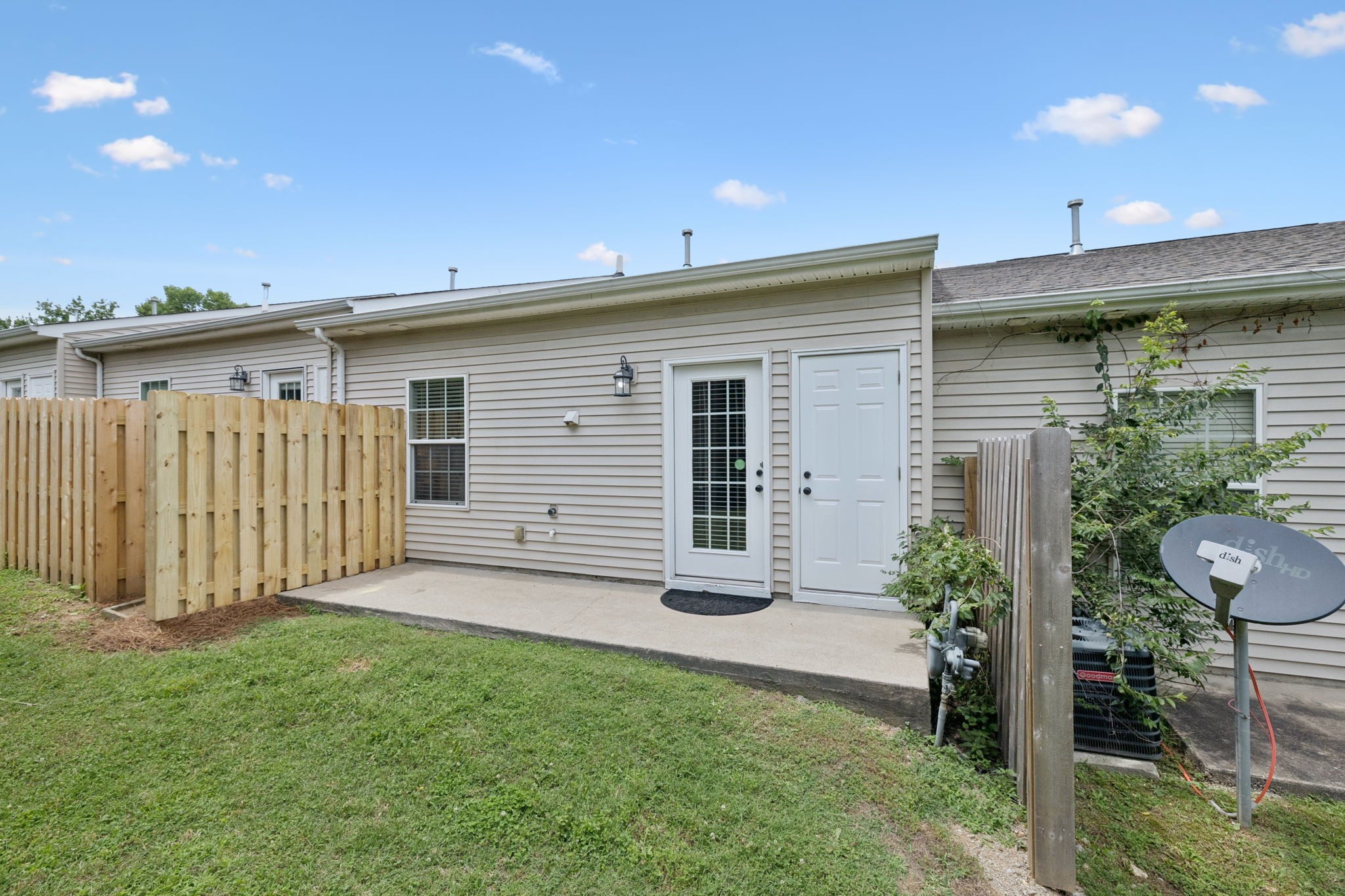 1101 Downs Boulevard, Unit 295 Franklin, TN 37064 - Photo 29 of 33 a front view of a house with a yard