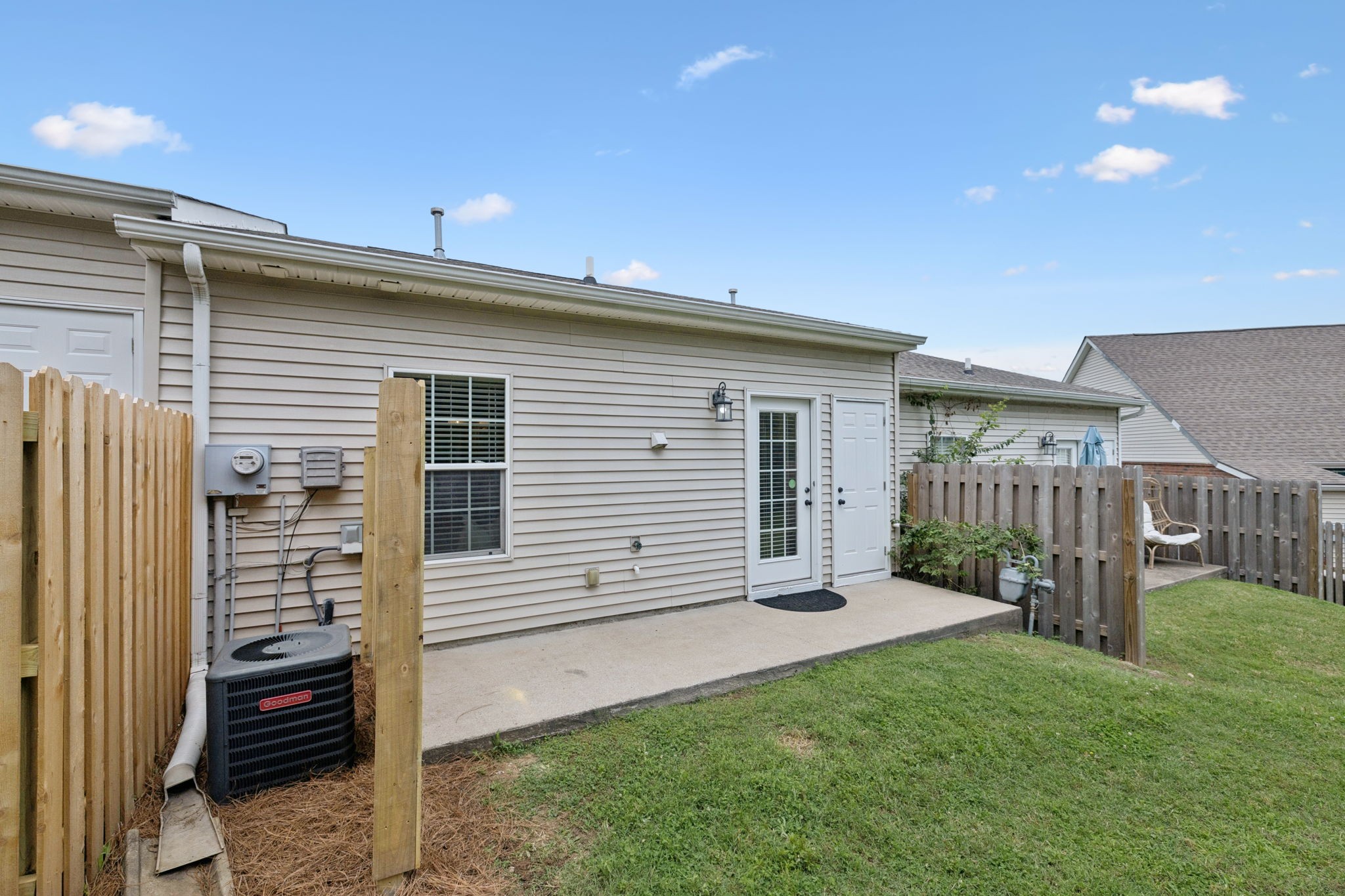 1101 Downs Boulevard, Unit 295 Franklin, TN 37064 - Photo 31 of 33 a view of a house with a yard and sitting area