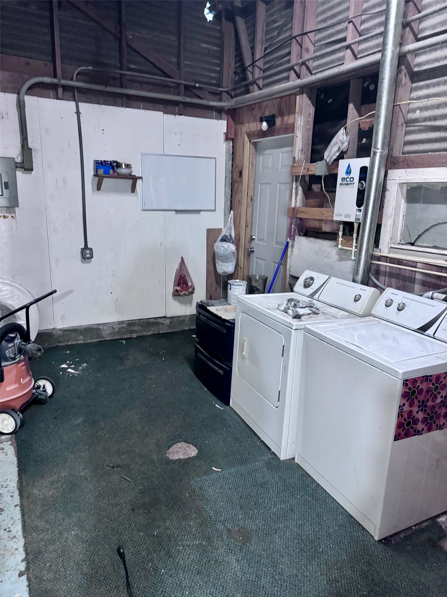 1937 Red Bluff Road Seabrook, TX 77586 - Photo 23 of 27 Laundry room is adjacent to a large workshop area not seen in this photo