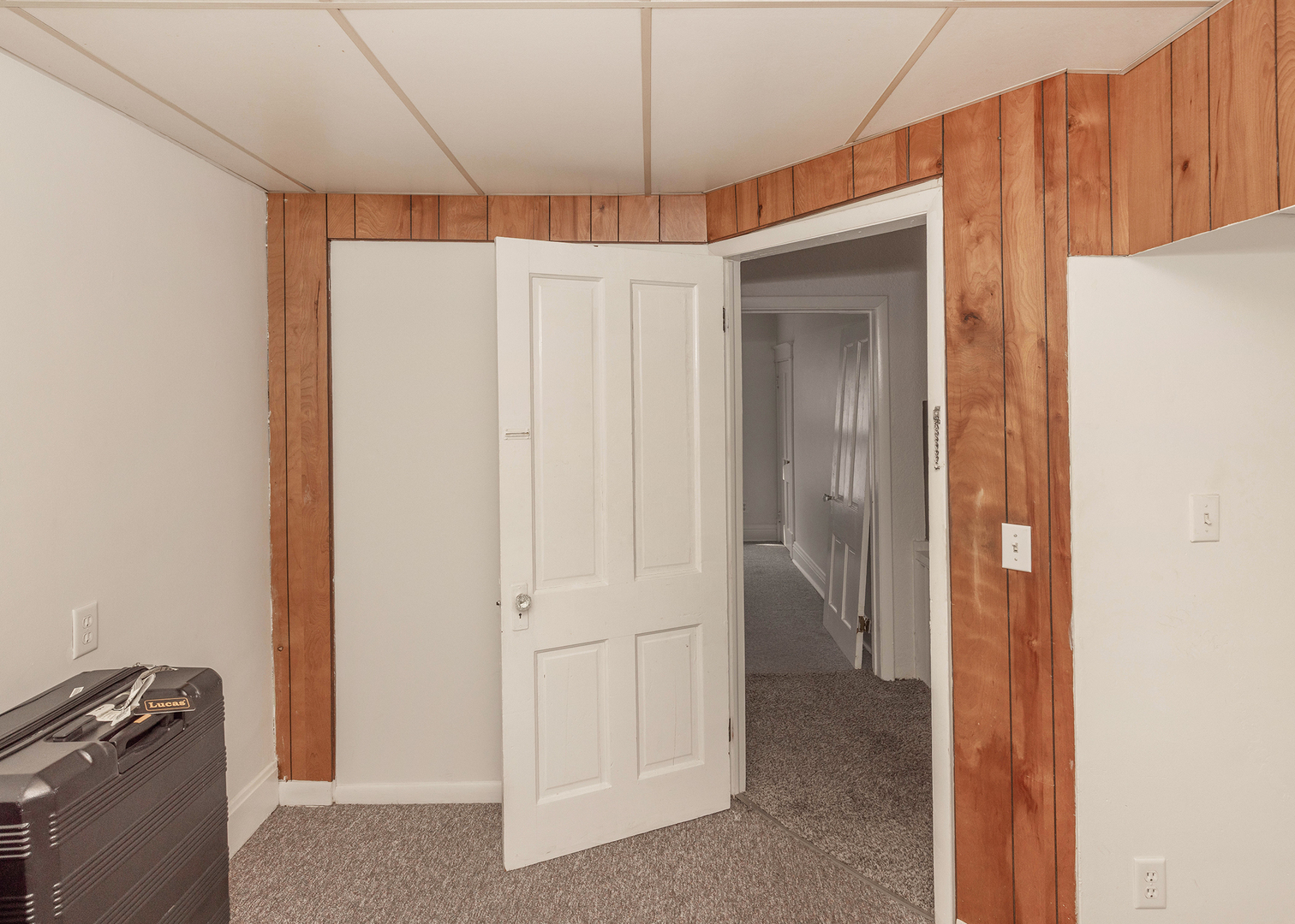 1839 15th Street Moline, IL 61265 - Photo 28 of 32 a view of a room with an entryway and chandelier