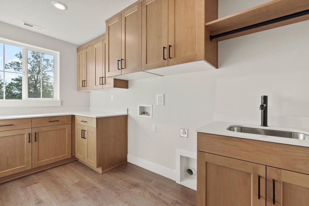 60940 Southeast Apollo Place Bend, OR 97702 - Photo 15 of 22 laundry room