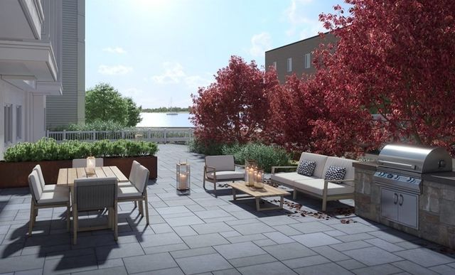 a backyard of a house with outdoor seating