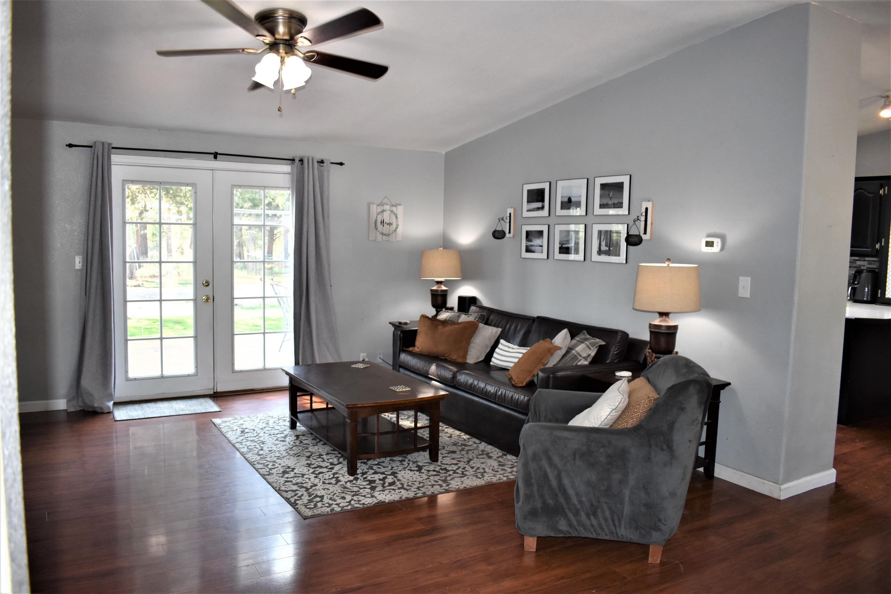 152229 Silver Spur Road La Pine, OR 97739 - Photo 7 of 41 Living Room with French Doors out to the back deck