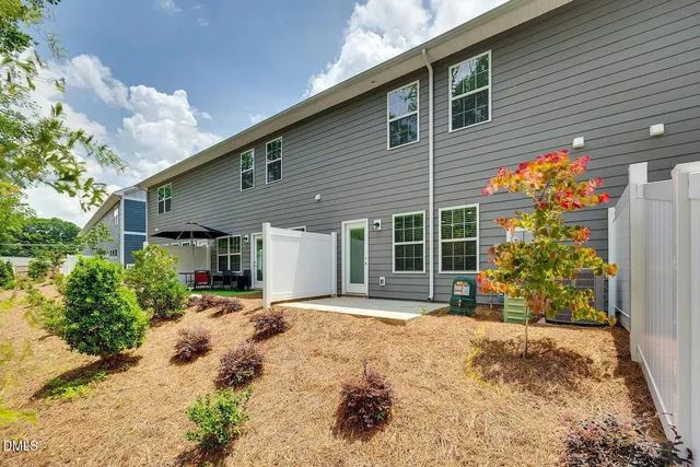 a view of an empty room and closet area