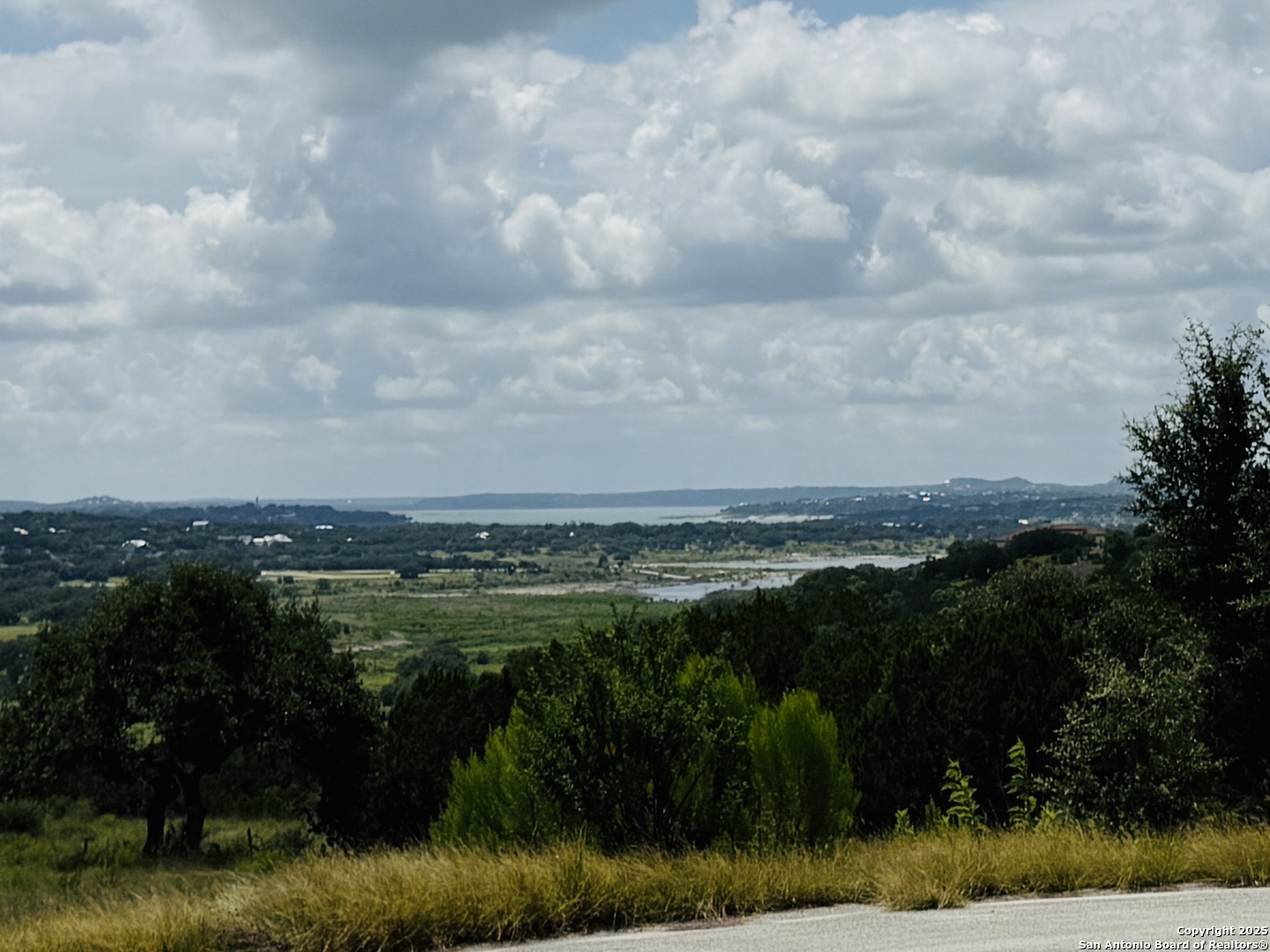 513 Gray Fox Spring Branch, TX 78070 - Photo 1 of 20 a view of a lake with a yard