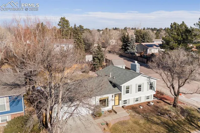 a view of a house with a big yard