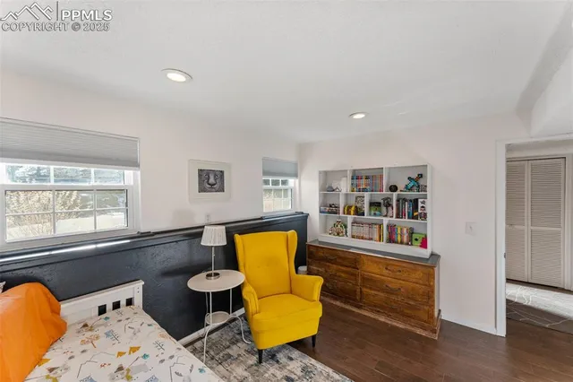 a living room with furniture and window