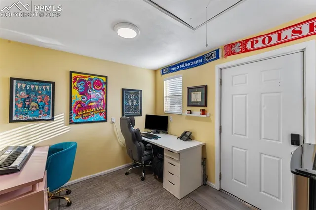 a view of a workspace with furniture