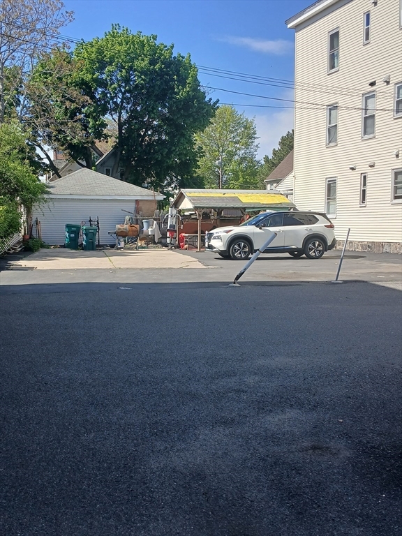 347 Summer Street, Unit 2 Lynn, MA 01905 - Photo 3 of 14 a view of street with parked cars