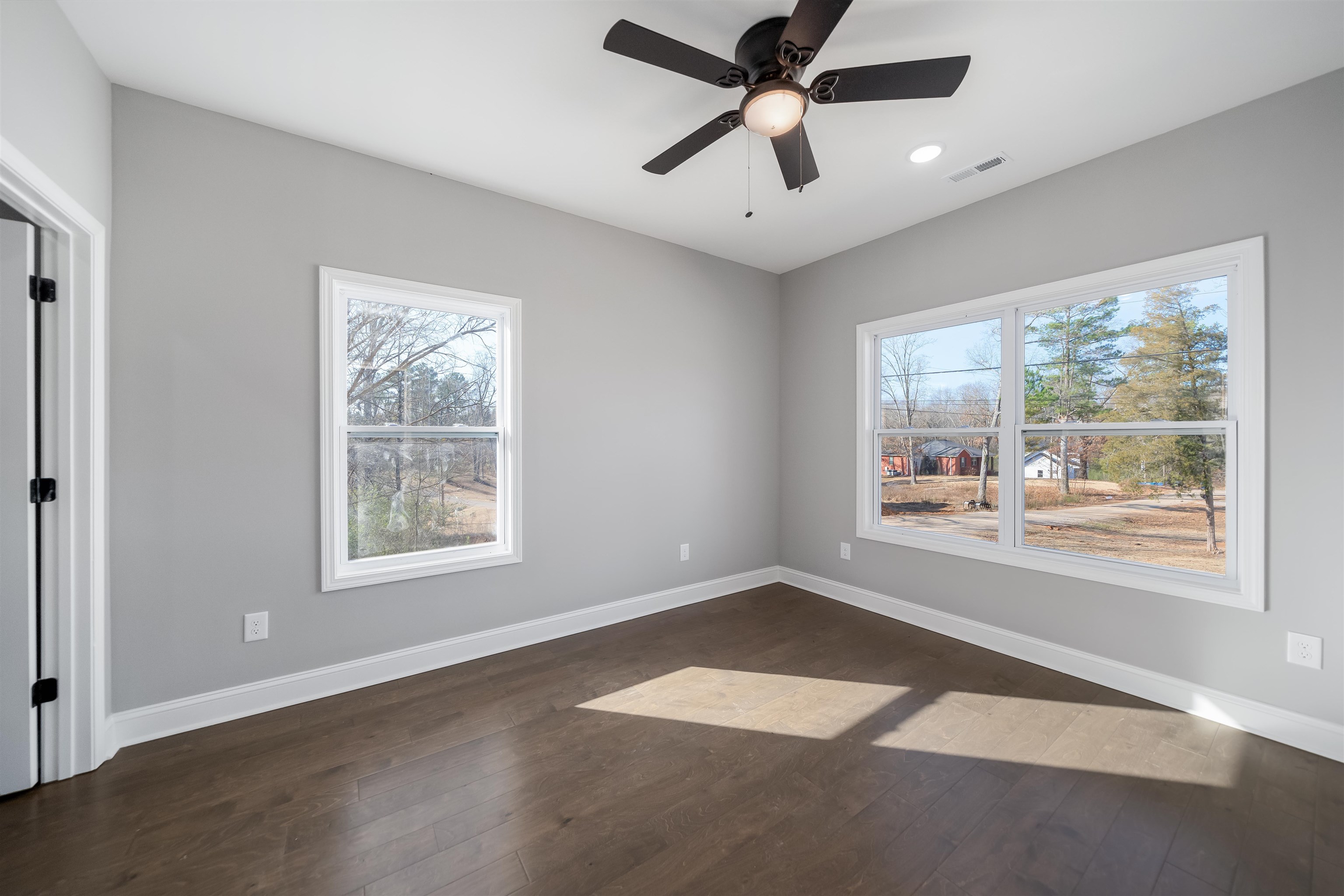 50 Deer Path Road Adamsville, TN 38310 - Photo 16 of 23 a view of an empty room with a window and a kitchen area