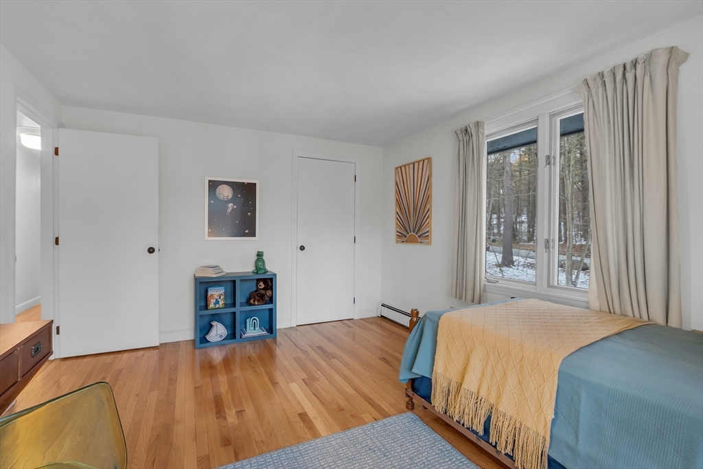117 Waite Road Boxborough, MA 01719 - Photo 25 of 37 a bedroom with a bed and a large window