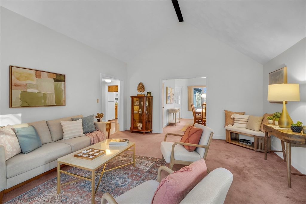 117 Waite Road Boxborough, MA 01719 - Photo 7 of 37 a living room with furniture and a lamp