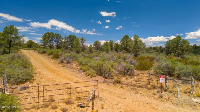 a bathroom with a granite countertop shower