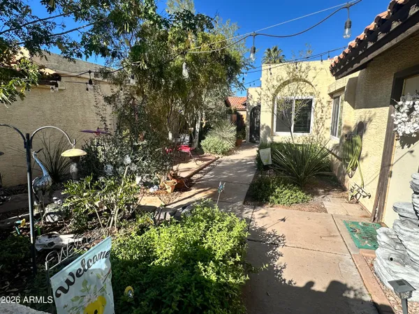 a backyard of a house with lots of green space