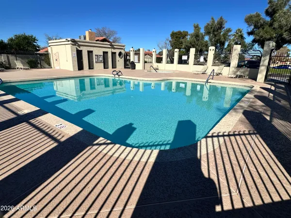 a front view of a house with swimming pool