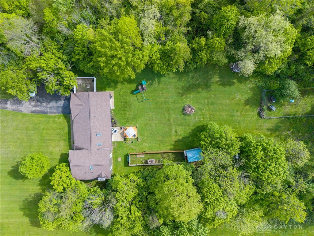 2165 Stewart Road Xenia, OH 45385 - Photo 40 of 59 An aerial perspective reveals a home nestled within a verdant, expansive property.