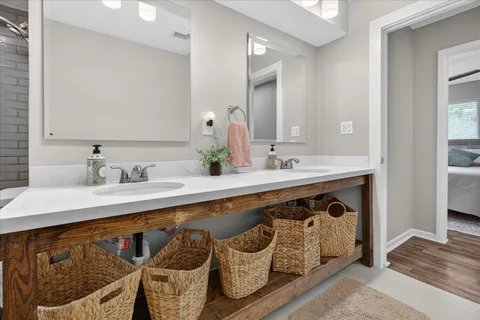 a bathroom with a sink and a mirror