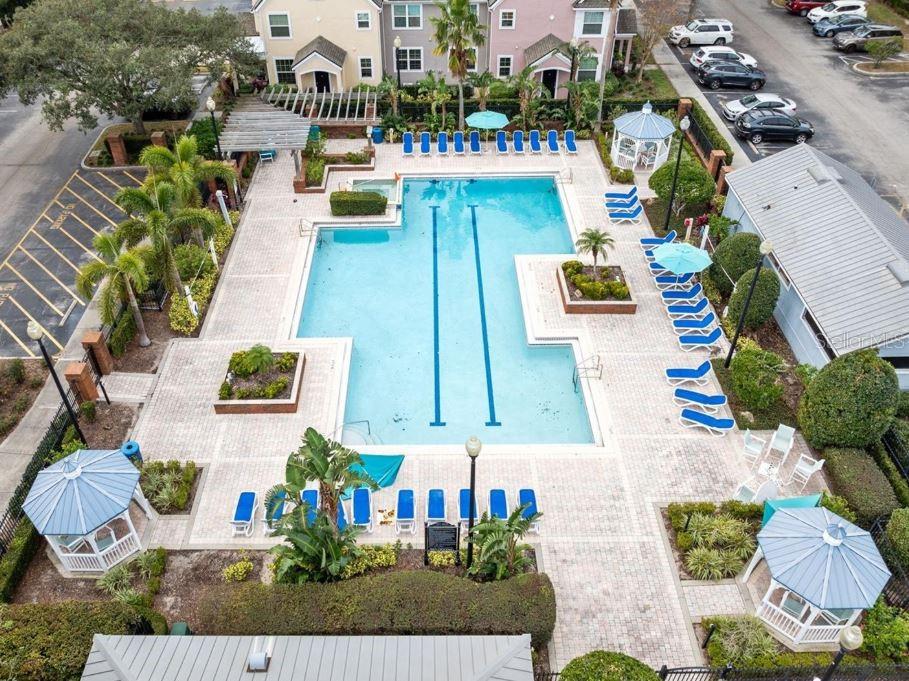 3446 Soho Street, Unit 108 Orlando, FL 32835 - Photo 15 of 39 an aerial view of a house with swimming pool and outdoor space