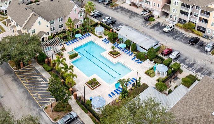 3446 Soho Street, Unit 108 Orlando, FL 32835 - Photo 16 of 39 an aerial view of a house a yard and outdoor seating