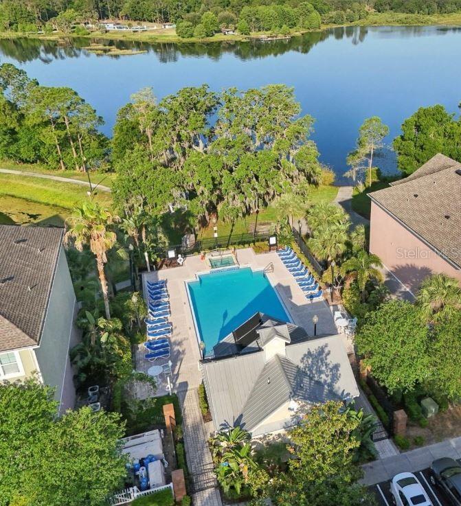 3446 Soho Street, Unit 108 Orlando, FL 32835 - Photo 19 of 39 an aerial view of a house with a lake view