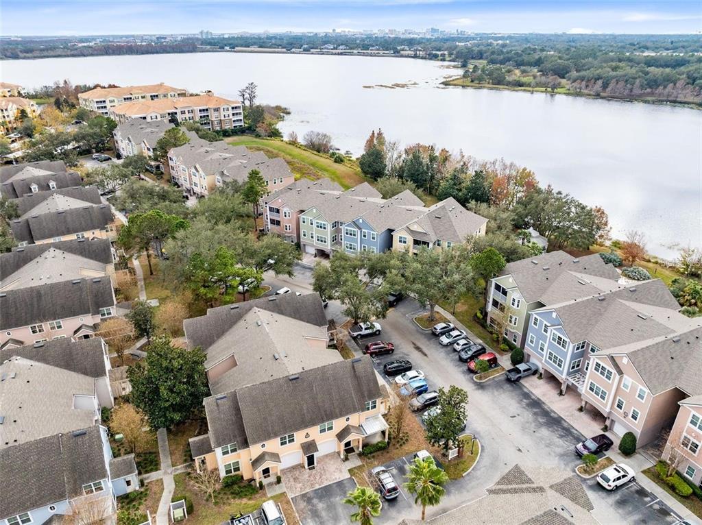 3446 Soho Street, Unit 108 Orlando, FL 32835 - Photo 24 of 39 an aerial view of a city with lake view