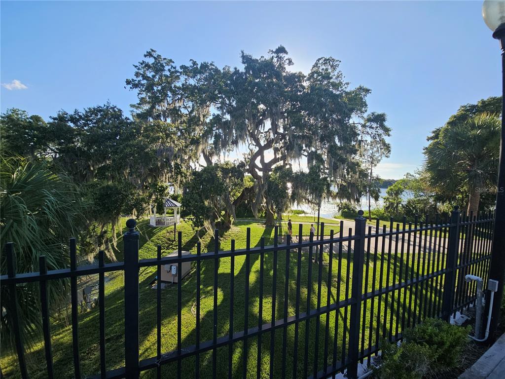 3446 Soho Street, Unit 108 Orlando, FL 32835 - Photo 26 of 39 a view of a swimming pool from a balcony