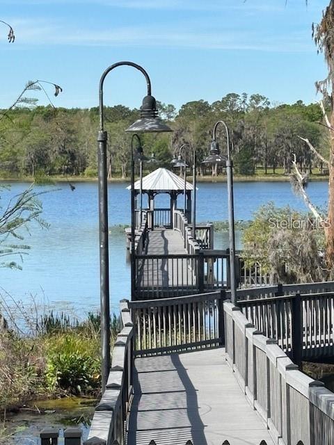 3446 Soho Street, Unit 108 Orlando, FL 32835 - Photo 34 of 39 a view of a balcony with an outdoor space