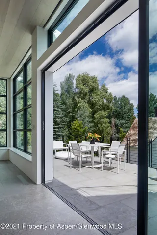 a view of living room and patio