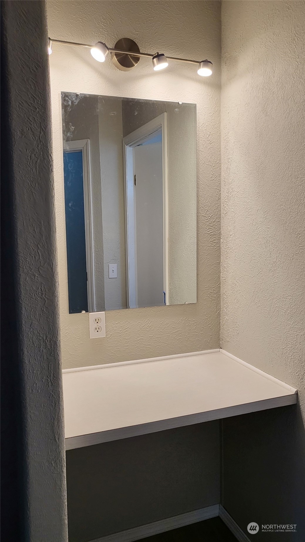 41528 Center Street Concrete, WA 98237 - Photo 15 of 25 a bathroom with a sink and a mirror