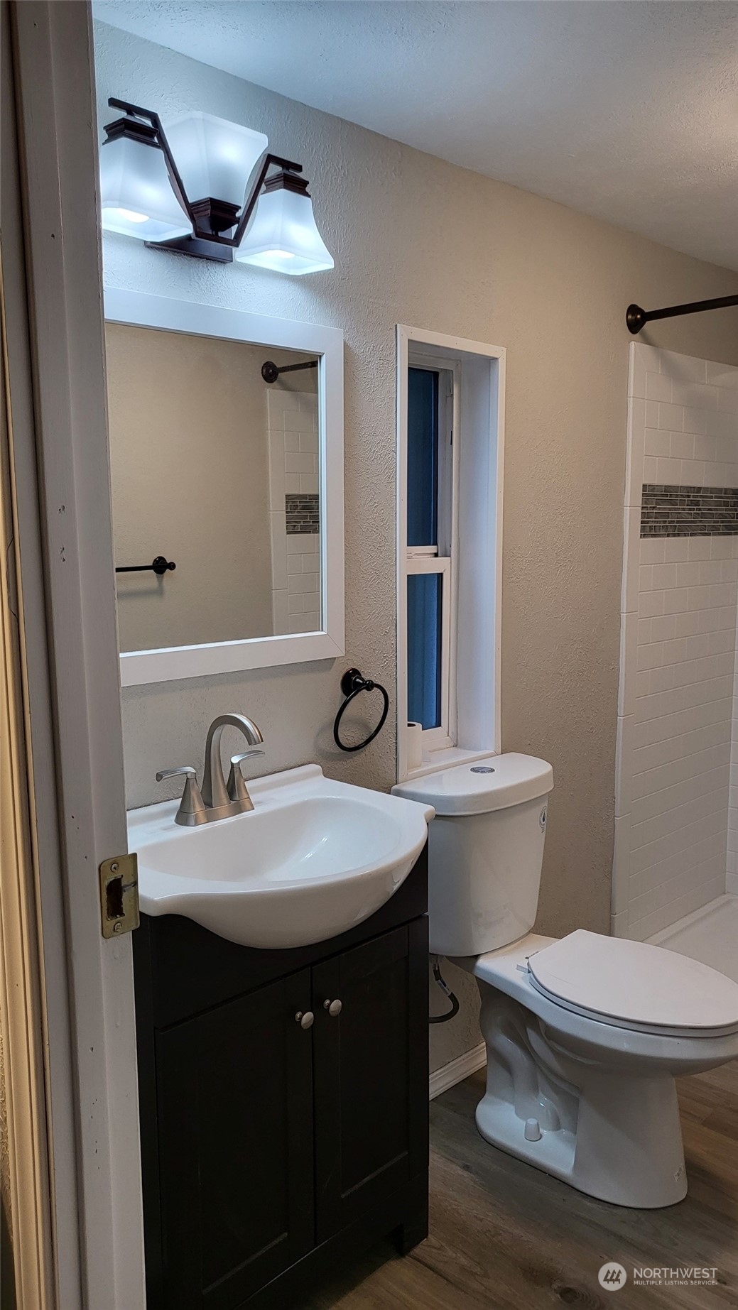 41528 Center Street Concrete, WA 98237 - Photo 16 of 25 a bathroom with a toilet a sink and mirror