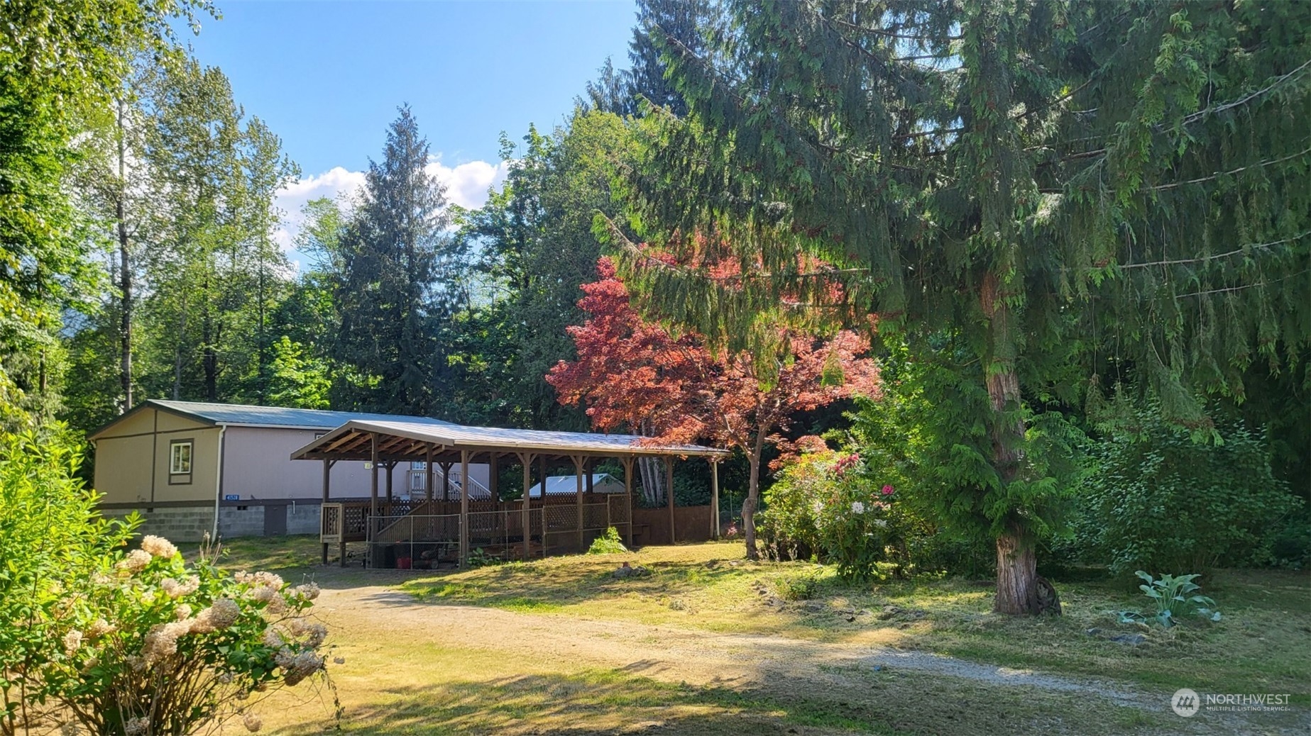 41528 Center Street Concrete, WA 98237 - Photo 2 of 25 a view of a house with a yard