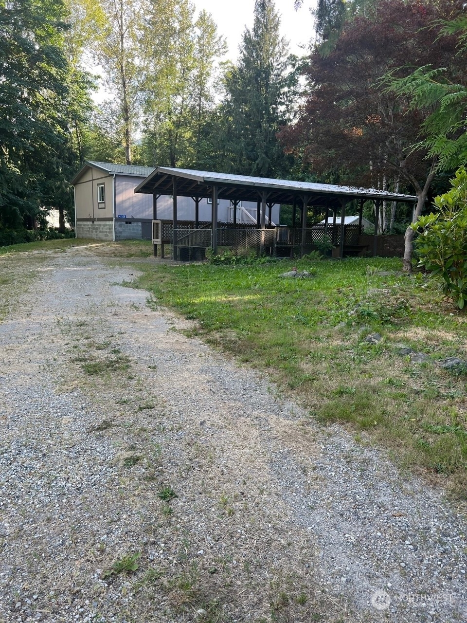41528 Center Street Concrete, WA 98237 - Photo 3 of 25 a view of a house with backyard and a hammock