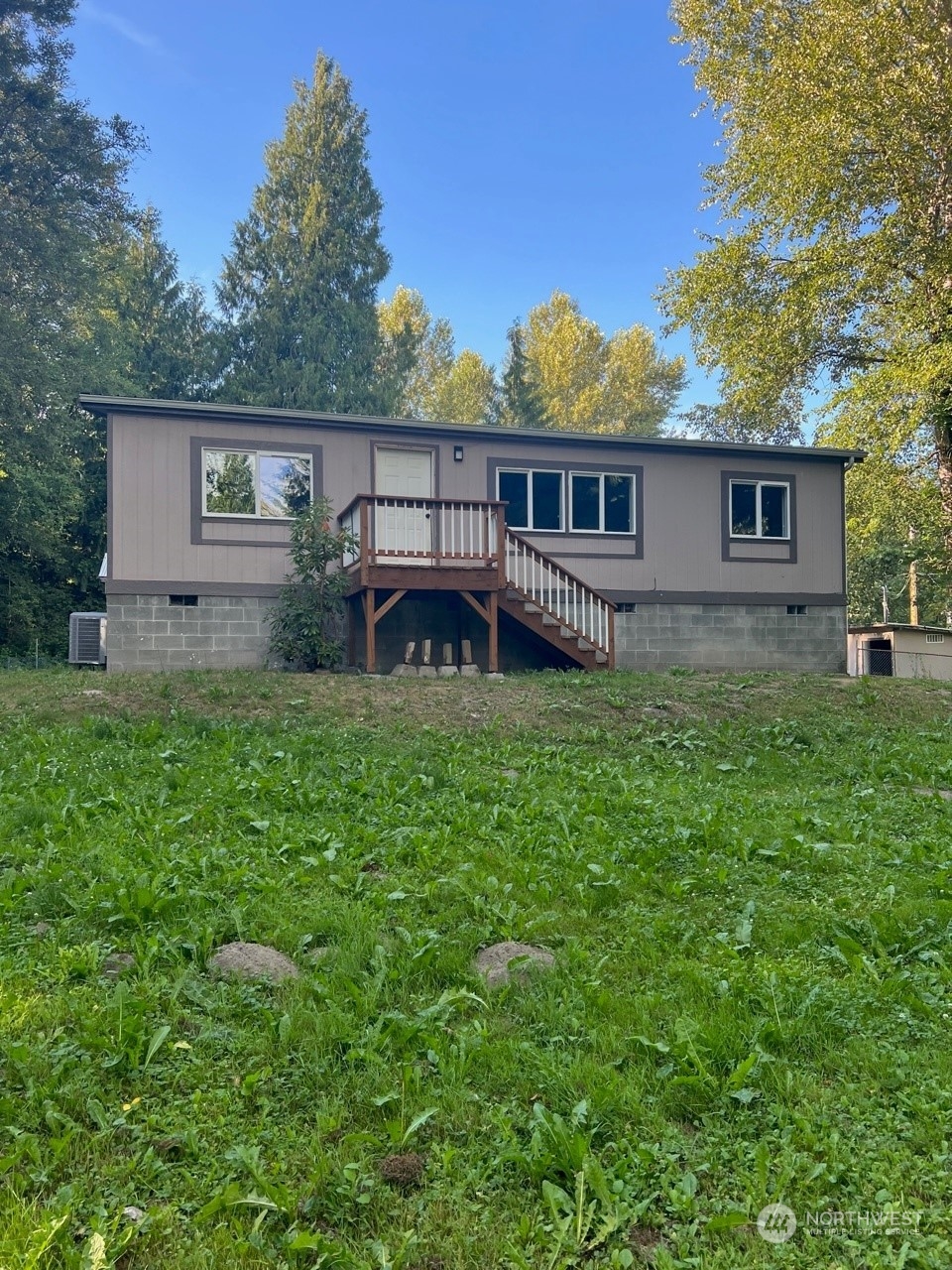 41528 Center Street Concrete, WA 98237 - Photo 4 of 25 a front view of a house with garden