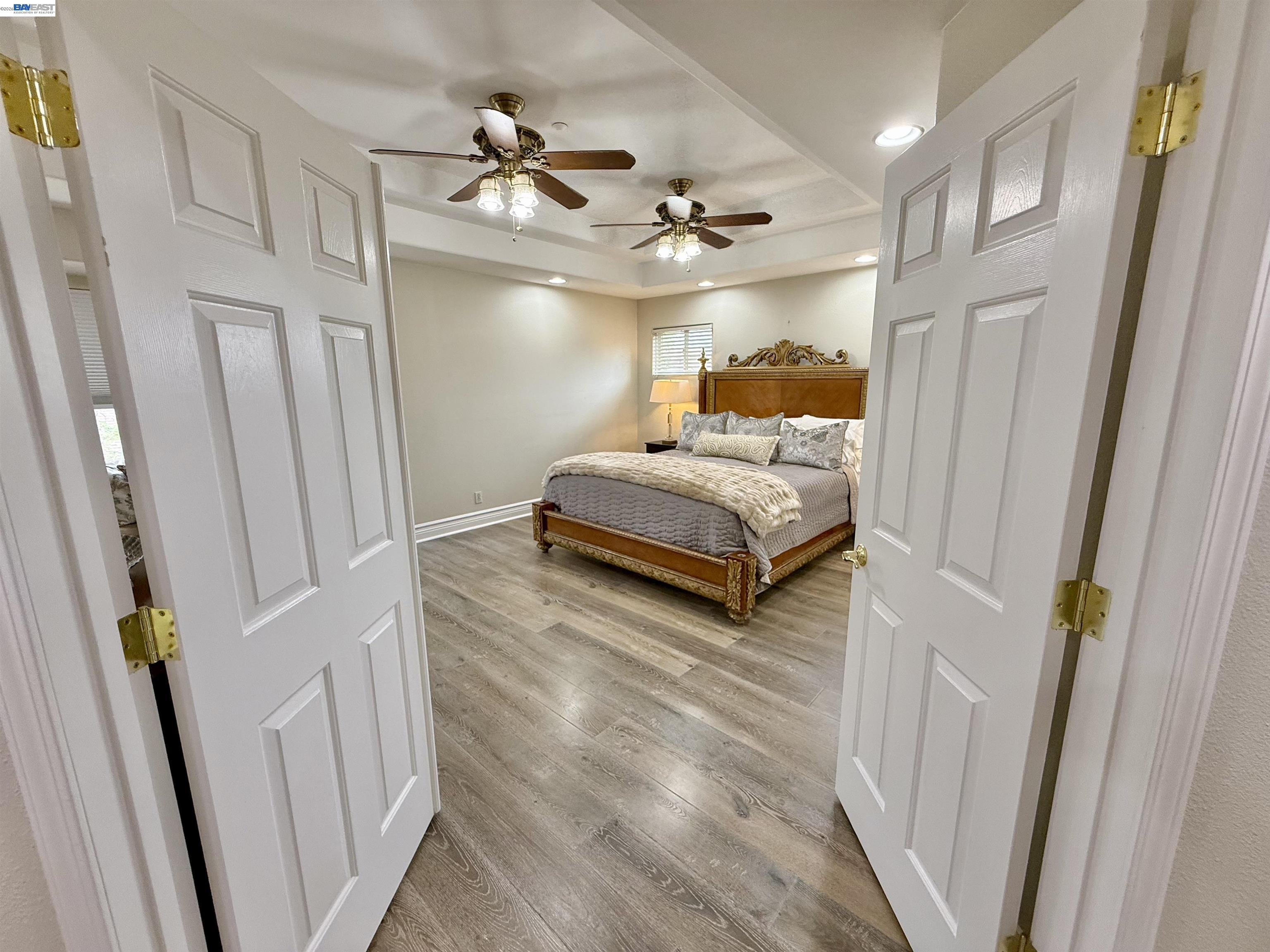 1284 Riesling Circle Livermore, CA 94550 - Photo 46 of 79 a spacious bedroom with a bed and a walk in closet