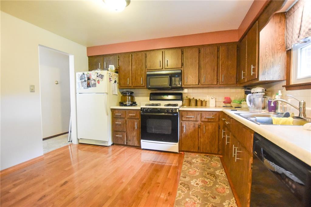 126 Morningside Drive Butler, PA 16002 - Photo 3 of 14 a kitchen with a sink cabinets and stainless steel appliances