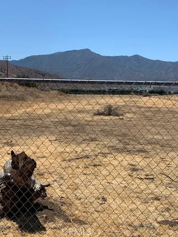 a view of an ocean and a mountain