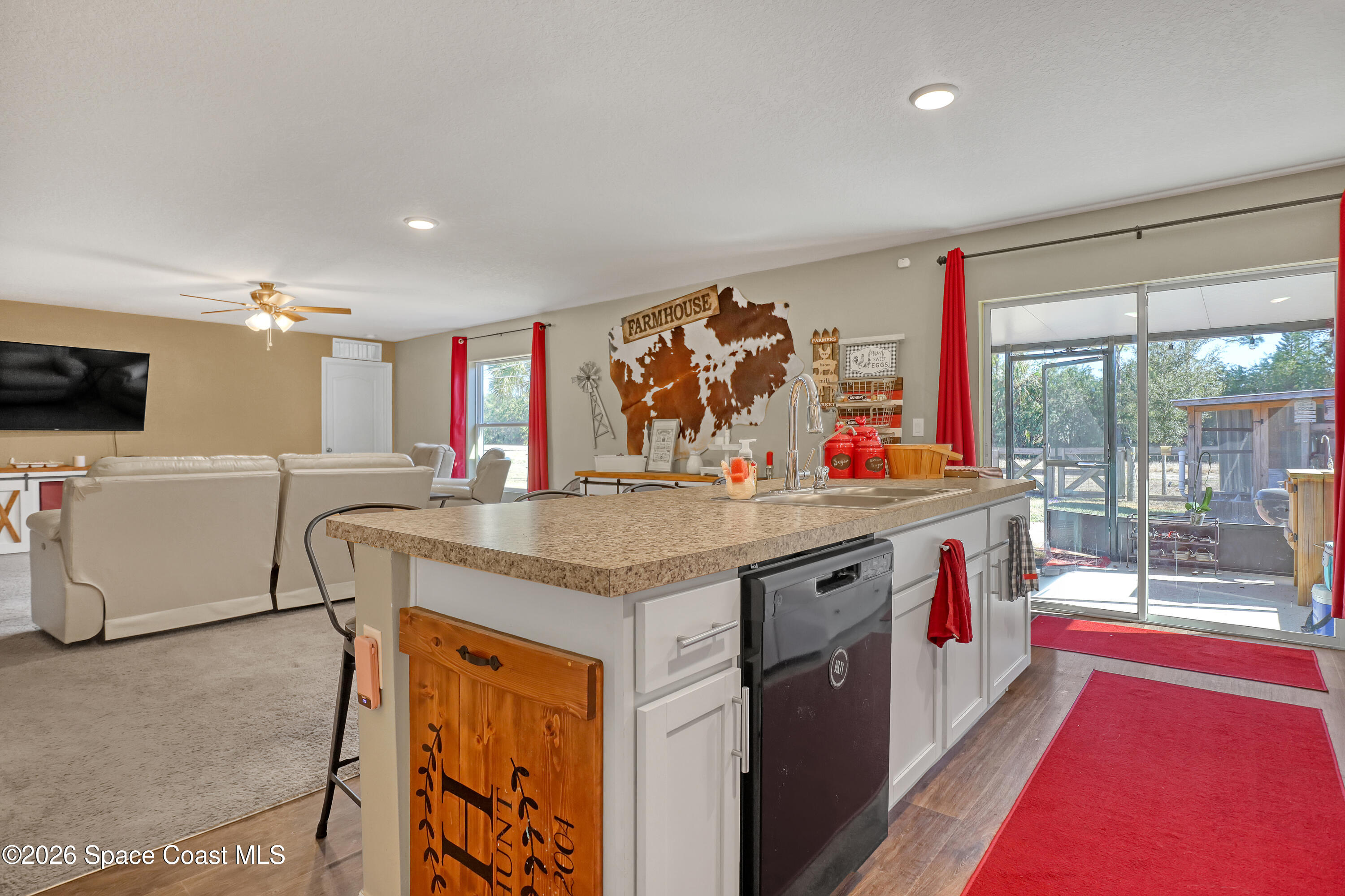 1247 Heitzman Avenue Southwest Palm Bay, FL 32908 - Photo 11 of 27 Kitchen open to Living room