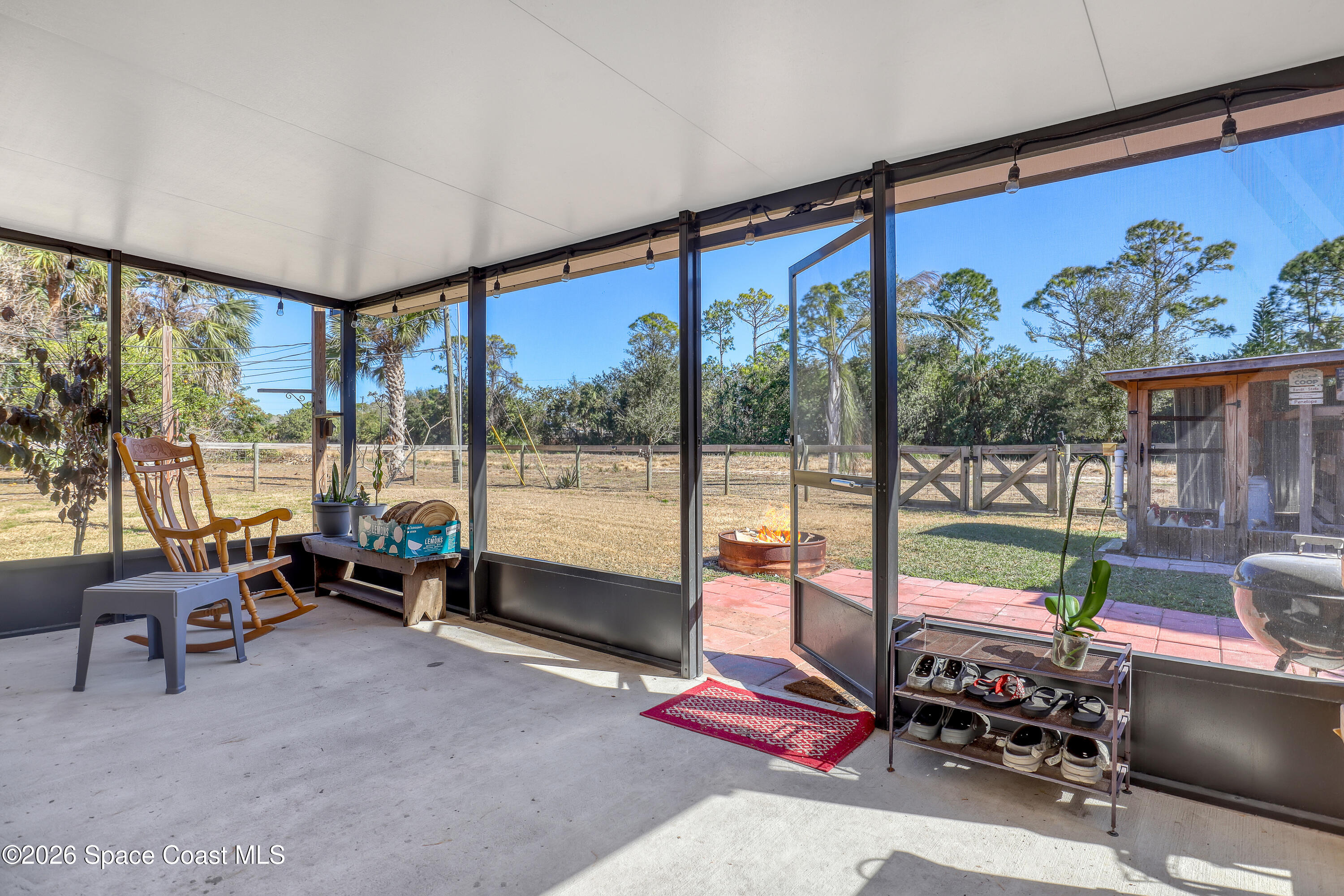 1247 Heitzman Avenue Southwest Palm Bay, FL 32908 - Photo 23 of 27 Screened proch