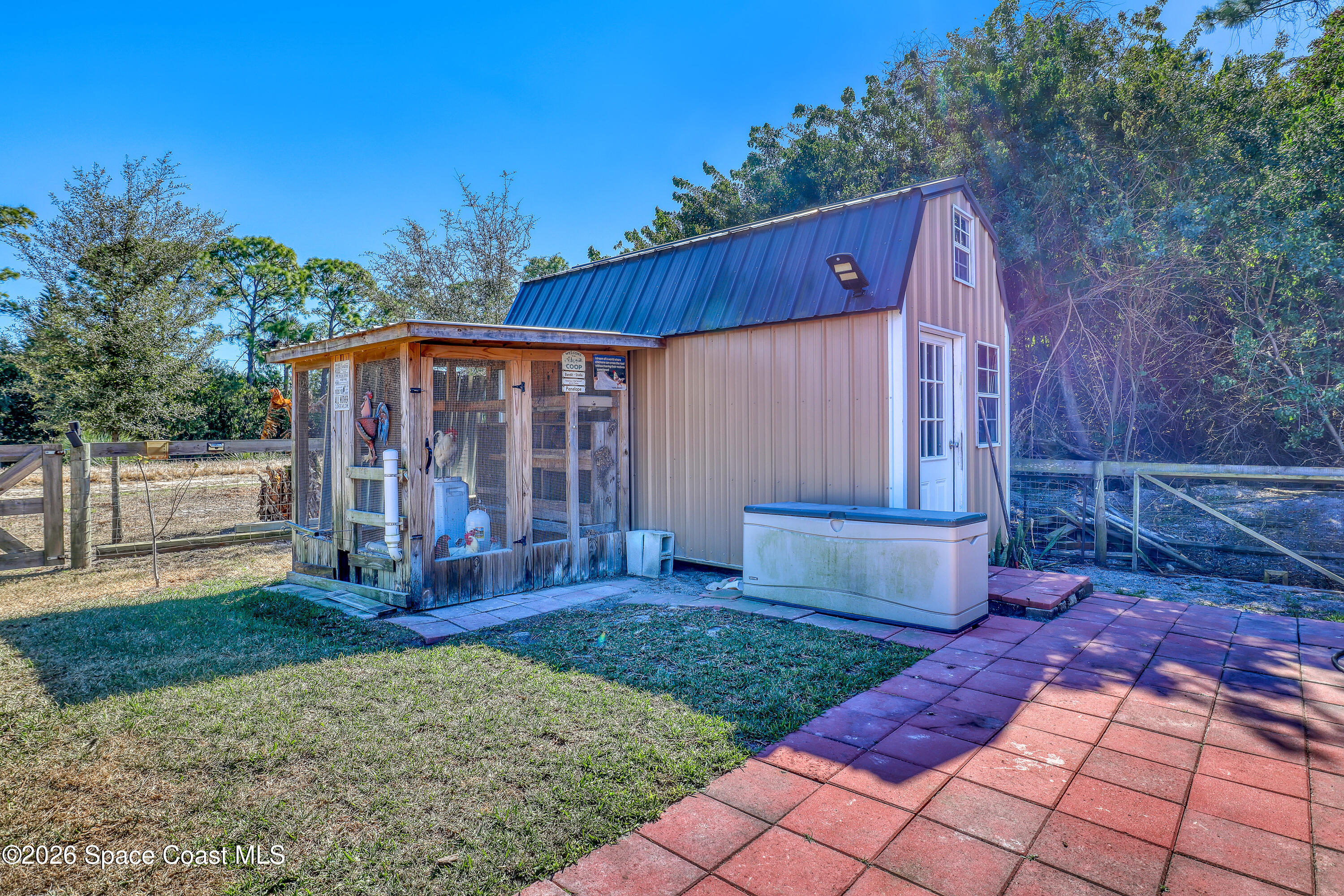 1247 Heitzman Avenue Southwest Palm Bay, FL 32908 - Photo 24 of 27 Shed & Chicken coop
